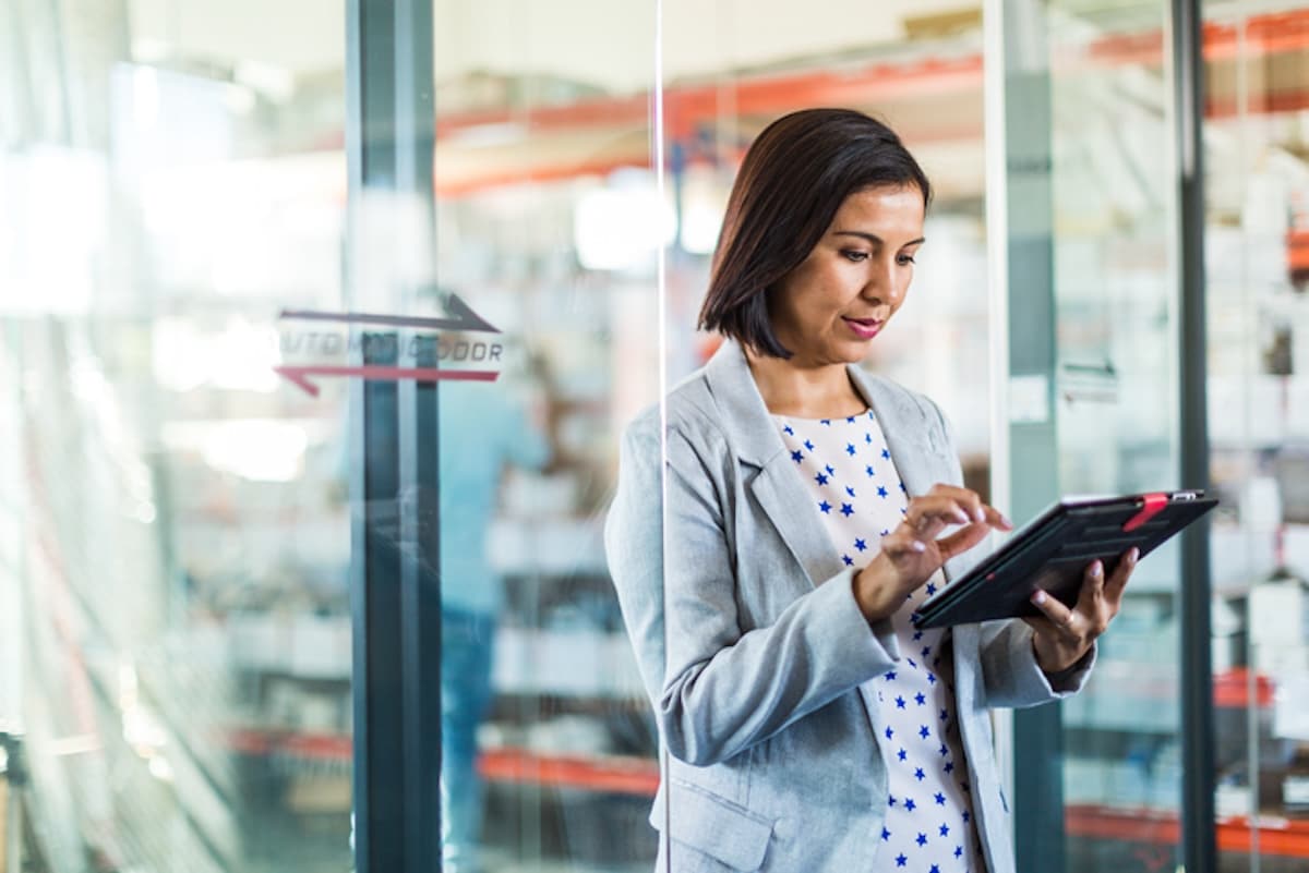 Businesswoman holding tablet