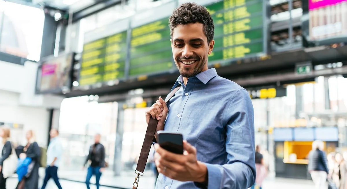 Man on phone in airport