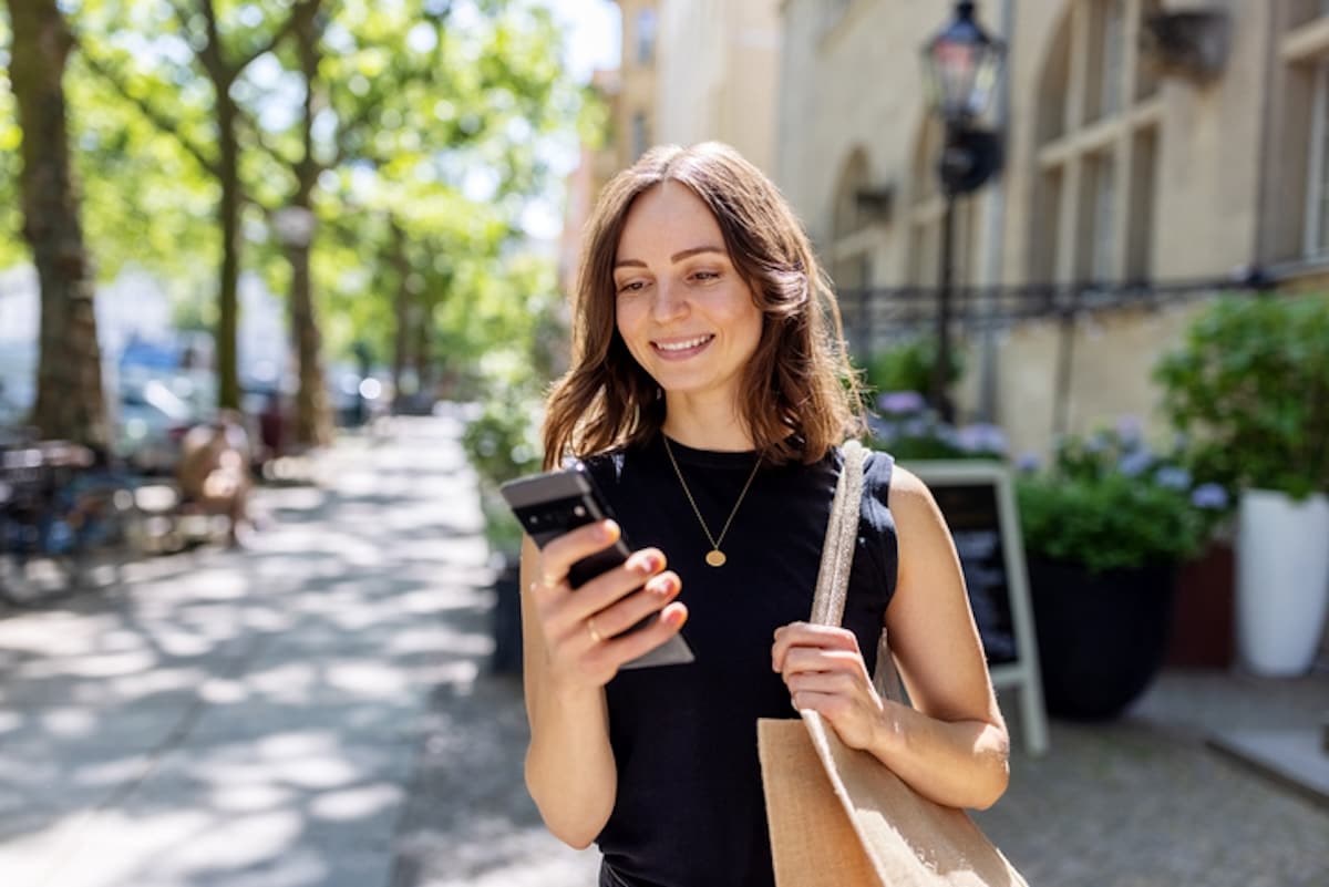 Smiling user of SAP Concur solutions