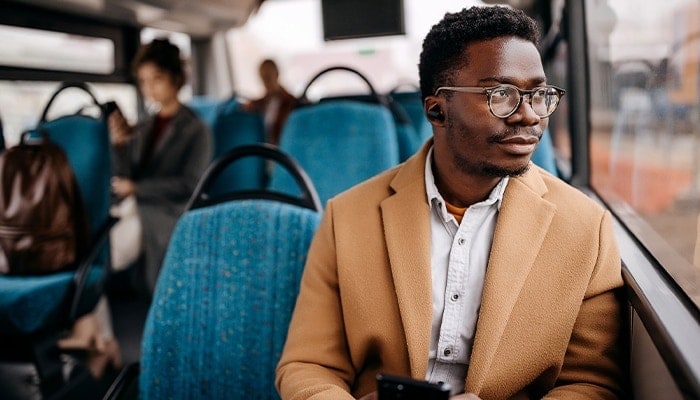 man using public transportation